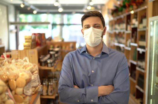Man In Shop With Mask